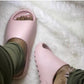 Pink foam slide sandal lifestyle image